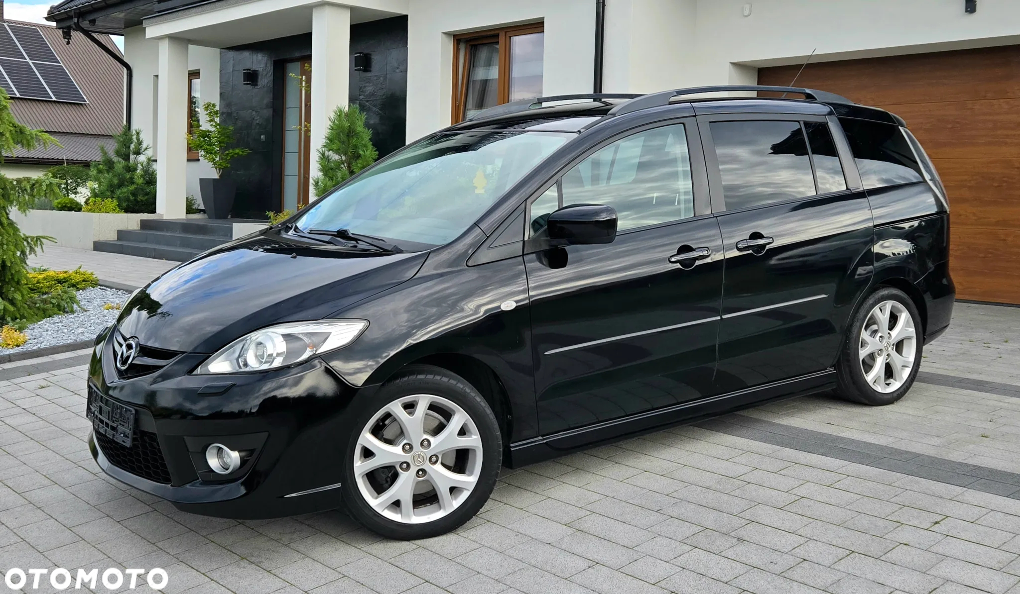 Mazda 5 2.0 Exclusive + - 12