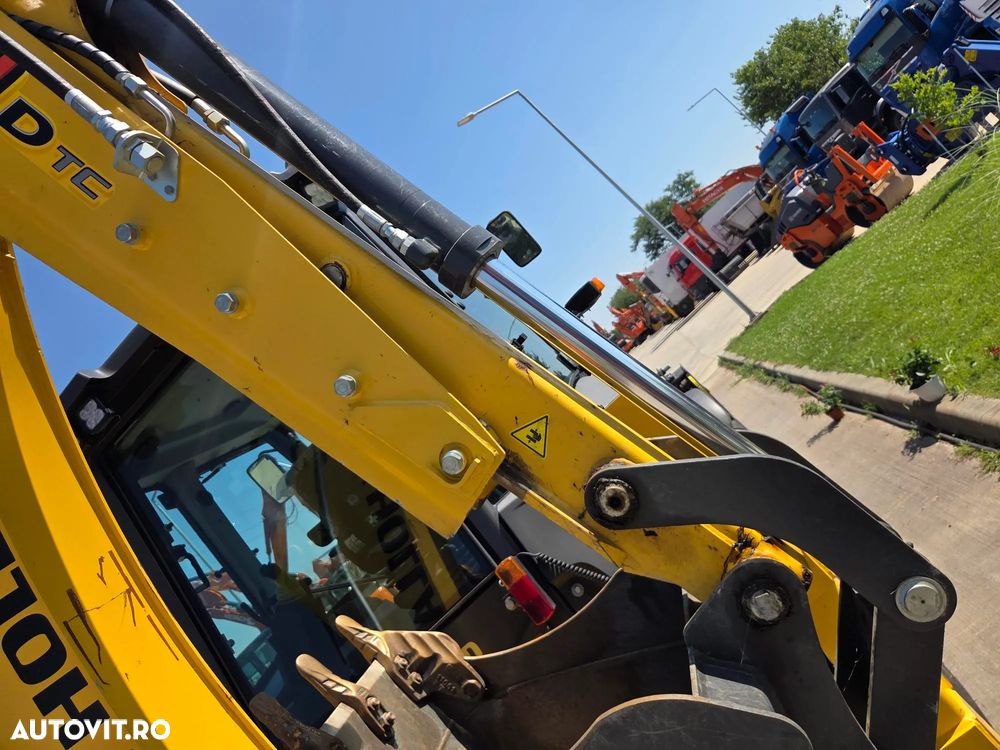 New Holland EX DEMO, 184h, B100D, FULL OPTION, 120CP, cutie automata POWERSHIFT, brat excavare extensibil cu inst picon pe el, MICHELIN, cupa multifunctionala 4x1, FURCI, Aer cond, Certificat CE, posibilitate leasing 4 ani-PROMOTIE 75.900 EUR+Tva - 14