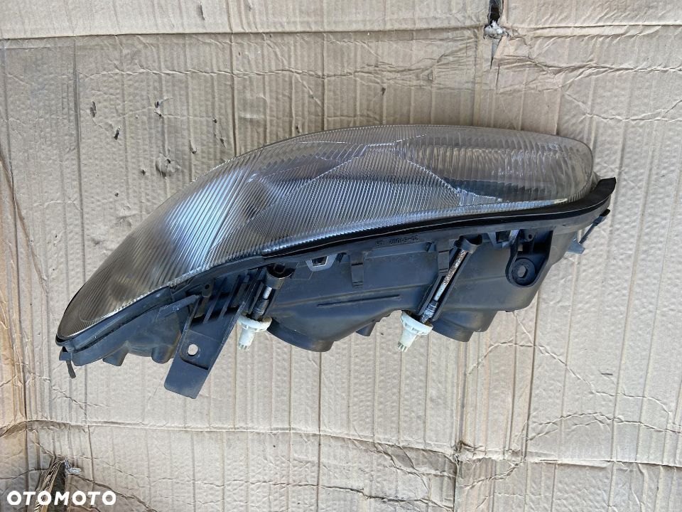 Lampa przednia lewa reflektor Opel Omega B Europa - 2