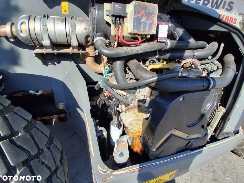 Claas SCORPION 7050 - 18