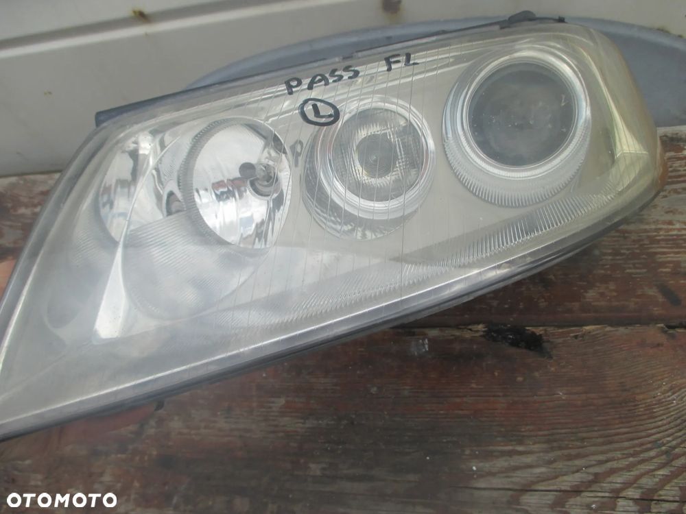 lampa lewa Passat B5 LIFT Xenon Hella Europa - 4