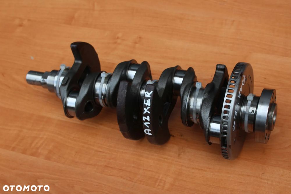 WAŁ KORBOWY OPEL ASTRA J CORSA D MERIVA 1.2 A12XER 55561959 - 2