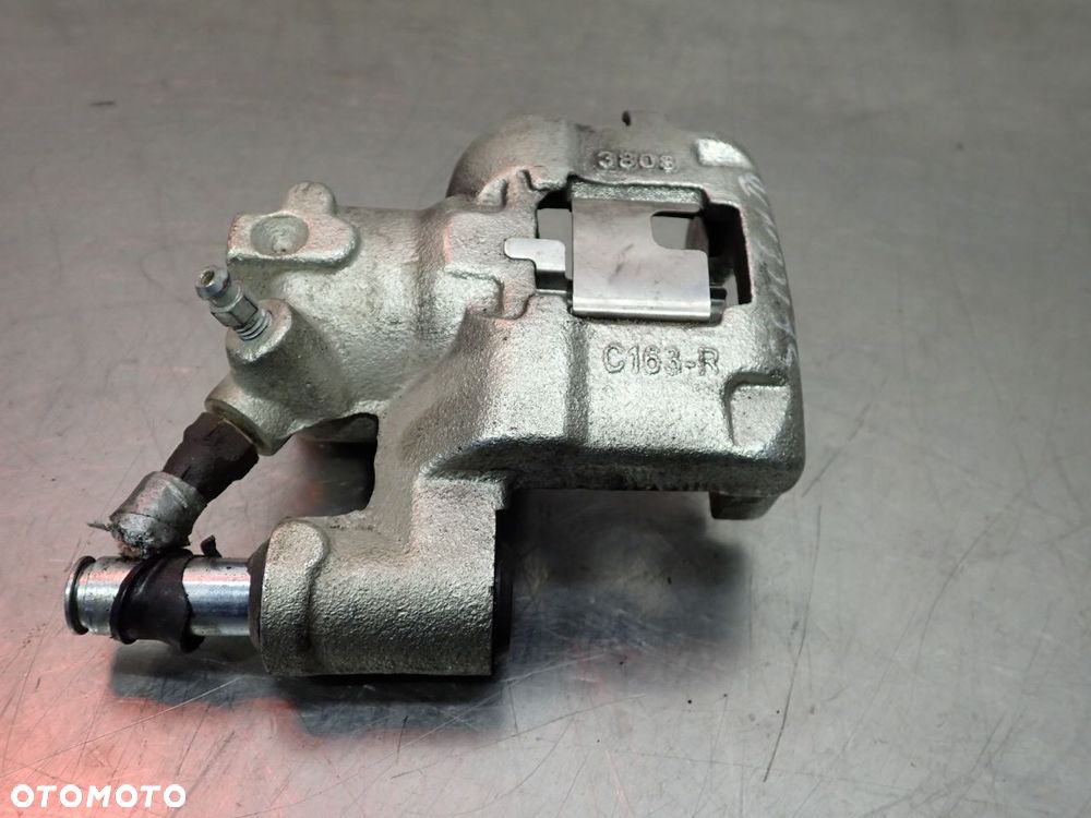 ZACISK HAMULCA PRAWY PRZÓD FIAT SEICENTO 899 - 4