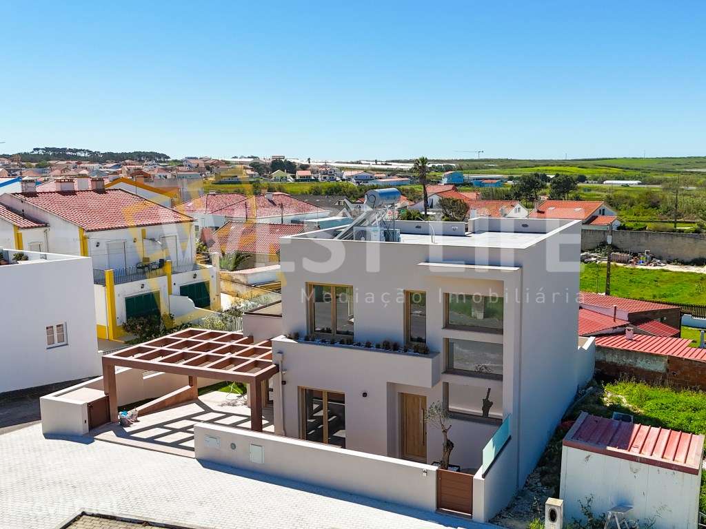 Moradia T3 NOVA de dois pisos com terraço e excelente exposição sol... - Grande imagem: 3/39