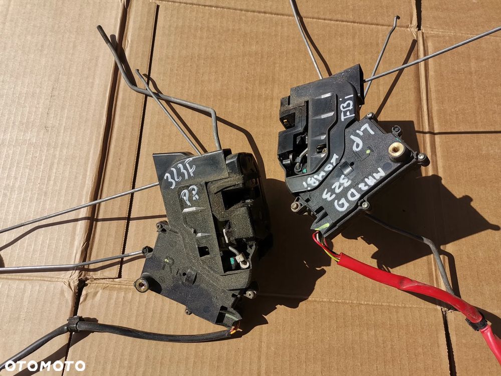 Zamek drzwi prawy lewy przod tyl MAZDA 323F BJ - 1