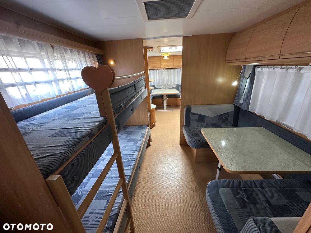 Burstner 720 TK VENTANA z napędem i łóżkami piętrowymi - 8 os. - 40