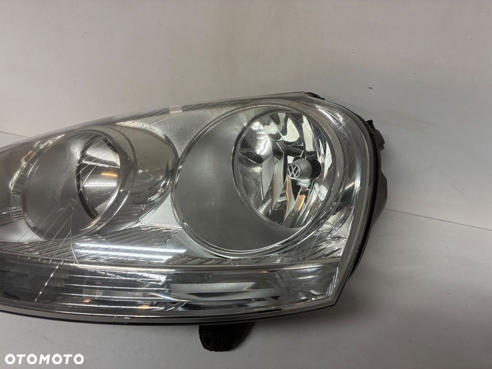VW GOLF V 5 LAMPA PRZÓD PRZEDNIA LEWA  EUROPA 1K6941005 - 9