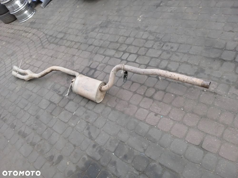 WYDECH TŁUMNIK VW PASSAT B7 KOMBI DIESEL - 1