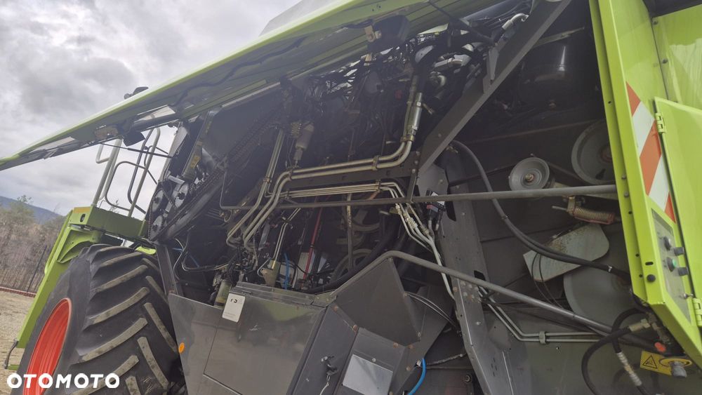 Claas Lexion 660 z hederem - 14