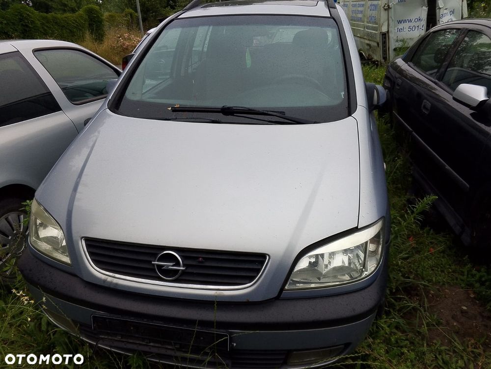 Opel Zafira A (99-03r.) 2.0 DTI 100KM. Silnik Y20DTH Skrzynia F23 WR lakier Z 151 / 94L.Cały na części.GWARANCJA !!! Przód Tył Zestaw Komplet Drzwi Klapa Zderzak Błotnik Maska Grill Atrapa Szyba Pas Lampa Lusterko Boczki Fotel Kanapa Kokpit Deska Rozdzielcza Przełącznik Włącznik Sterownik Przewody Wiązka Instalacja Moduł Komputer Czujnik Listwa Pompa Alternator Wtryski Głowica Rozrusznik Kompresor Sprzęgło Dwumas Silnik Skrzynia ABS Klimatyzacji Paliwa Wspomagania Kolektor Turbina Przepustnica Zawór Chłodnica Koło Hak Belka Sanki Zawieszenie Mcpherson Półoś Amortyzator Wydech Tłumik Zacisk Most - 2