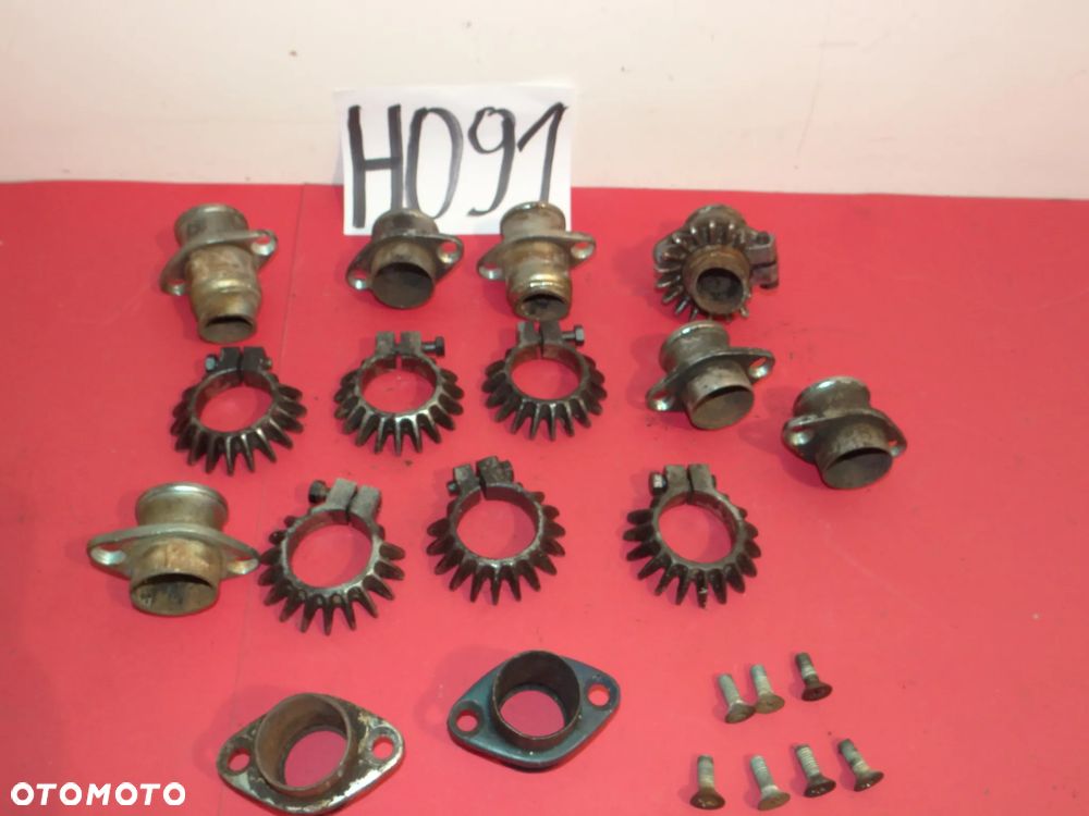 HONDA CB 750 FOUR . KLAMRA MOCOWANIE UCHWYT WYDECH KOLEKTORA Króciec Kolektora  H091 - 7