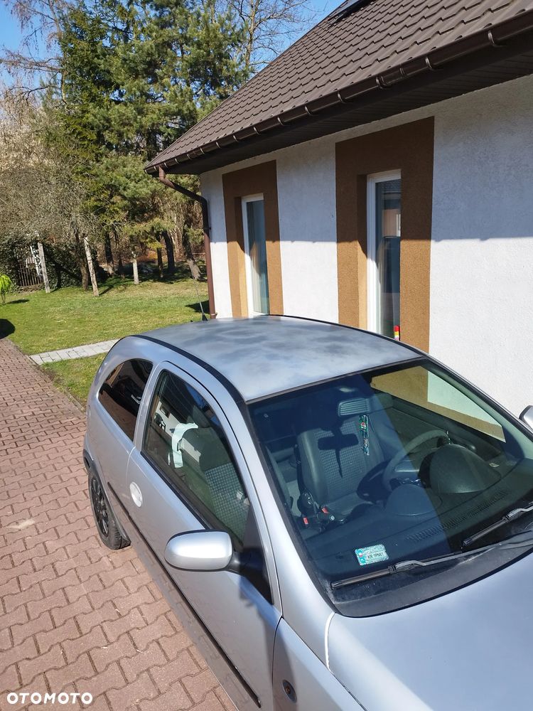 Opel Corsa 1.2 16V Cosmo - 9