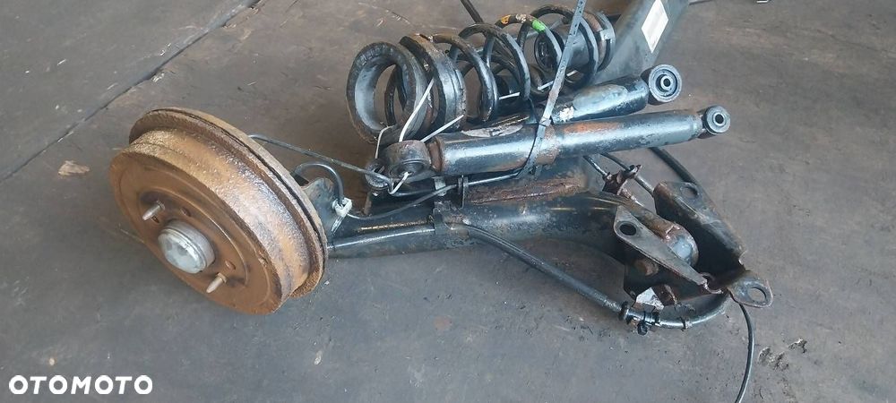 BELKA OŚ ZAWIESZENIA TYŁ BĘBNY Z ABS AMORTYZATORY SPRĘŻYNY FIAT IDEA - 4