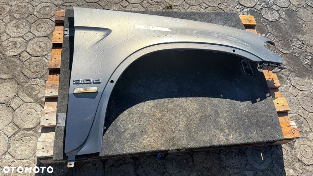 BŁOTNIK BMW E53 PRAWY - 1