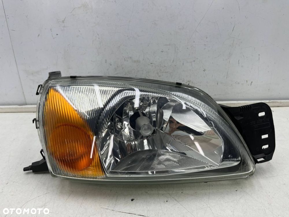 Lampa reflektor Ford Fiesta IV MK4 LIFT 99-02r. prawa przednia Europa oryginal Bosch - 1