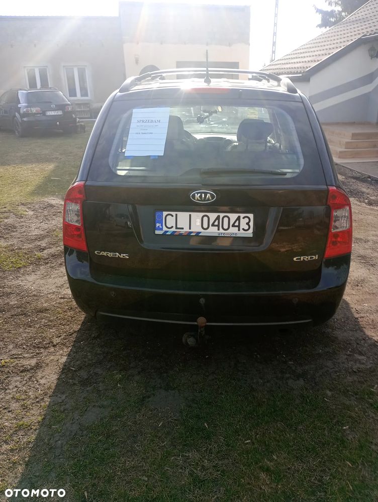 Kia Carens - 13
