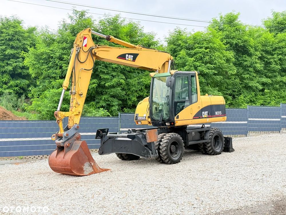 Caterpillar CAT M315C  CATERPILLAR SPROWADZONY  Bardzo Dobry Stan - 1