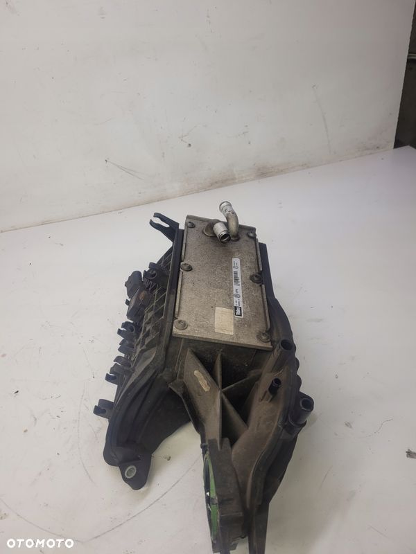 KOLEKTOR SSĄCY VW AUDI SKODA 1.4 TFSI 03C129711AD - 2