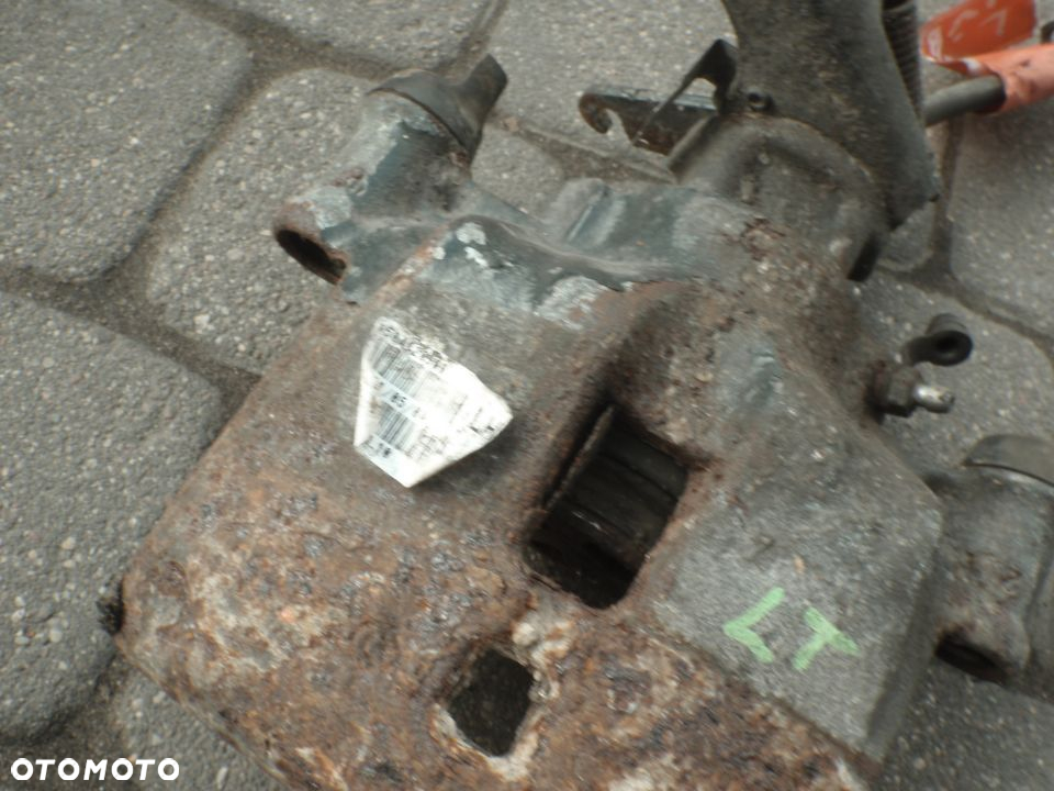 zacisk jarzmo hamulcowy prowadnica tył iveco daily 35c  oryginał jak nowy orginał - 7