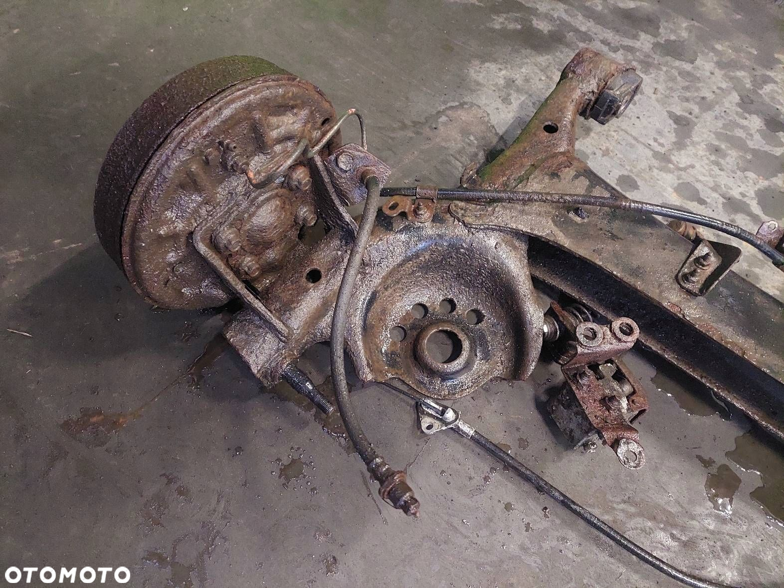 BELKA OŚ ZAWIESZENIA TYŁ BĘBNY BEZ ABS TOYOTA YARIS I - 4
