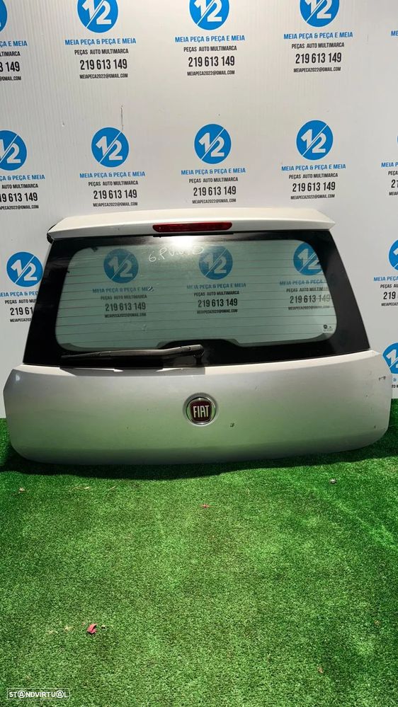 Tampa da mala Fiat Grand Punto - 1