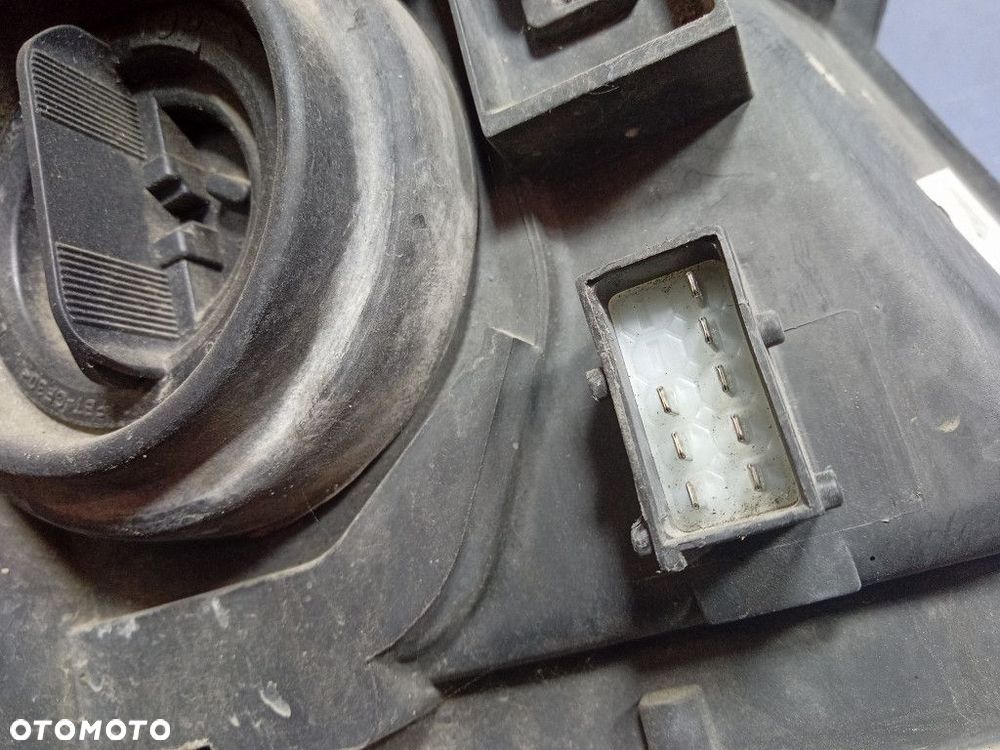 OPEL MERIVA A REFLEKTOR LEWY LAMPA EU 93321052 - 4