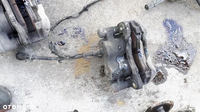 IVECO DAILY 35 40 50 C !! Zacisk prawy/ lewy tylny !! TYŁ ! 99-06r. - 2