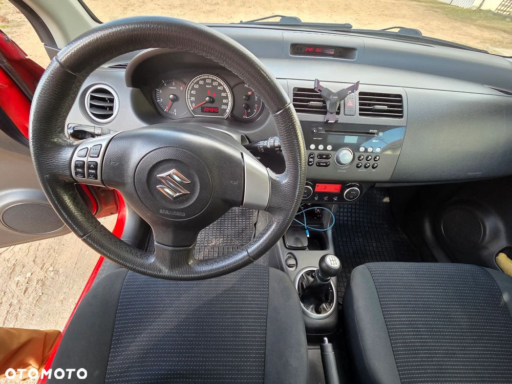 Suzuki Swift 1.3 DDiS Comfort - 9