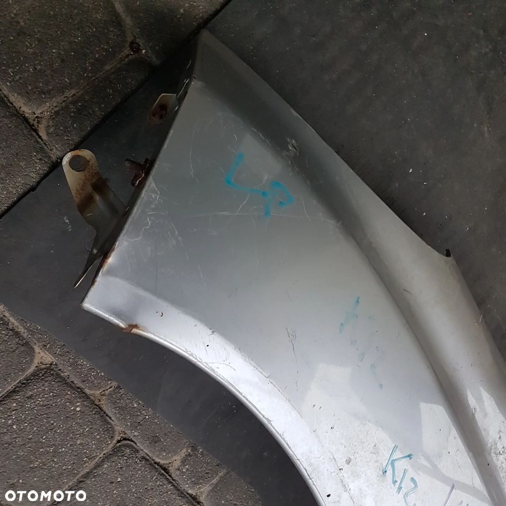 błotnik nissan micra k12 lewy oryginal - 11