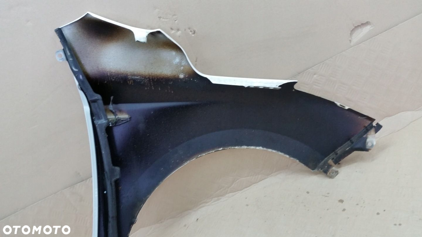 HYUNDAI I20 LIFT 12- BŁOTNIK PRZÓD LEWY ORYGINAŁ PHW - 10