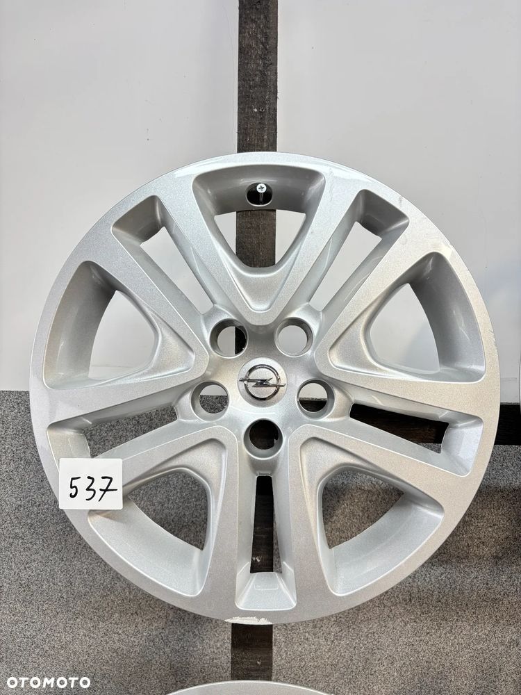 4 Kołpaki Opel Astra J, K 5x105, 16", Strukturalne 13409779 AAMV - 2