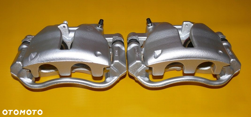 ZACISKI LEWY PRAWY TYŁ VOLKSWAGEN CRAFTER 303/28mm BLIŹNIAK 06r- - 2