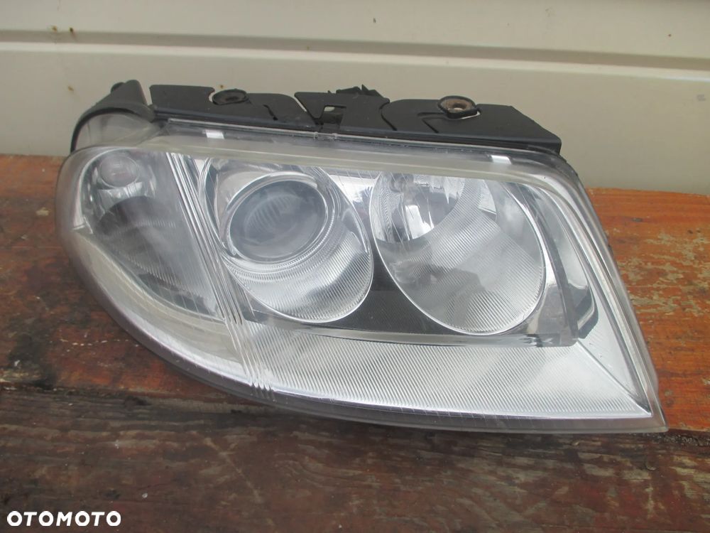 lampa prawa VW Passat B5 LIFT Hella Europa - 1