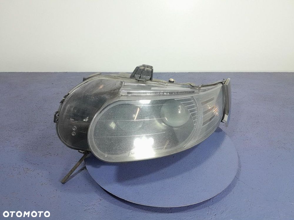 SAAB 9-5 I LIFT REFLEKTOR LAMPA LEWY EU - 1