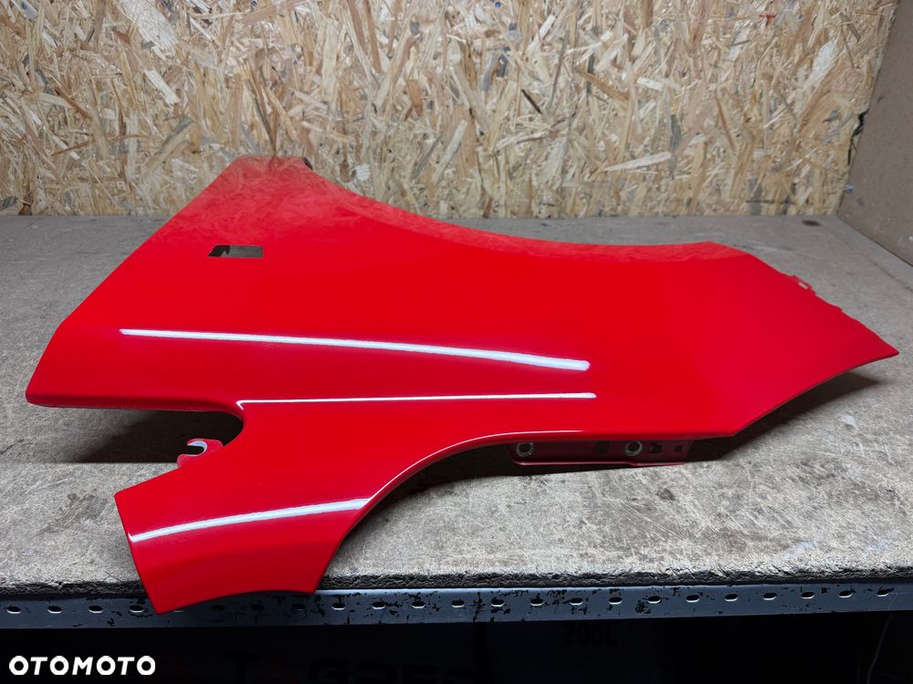 BŁOTNIK LEWY PRZÓD LEWY PRZEDNI OPEL CORSA E CZERWONY 50B - 12