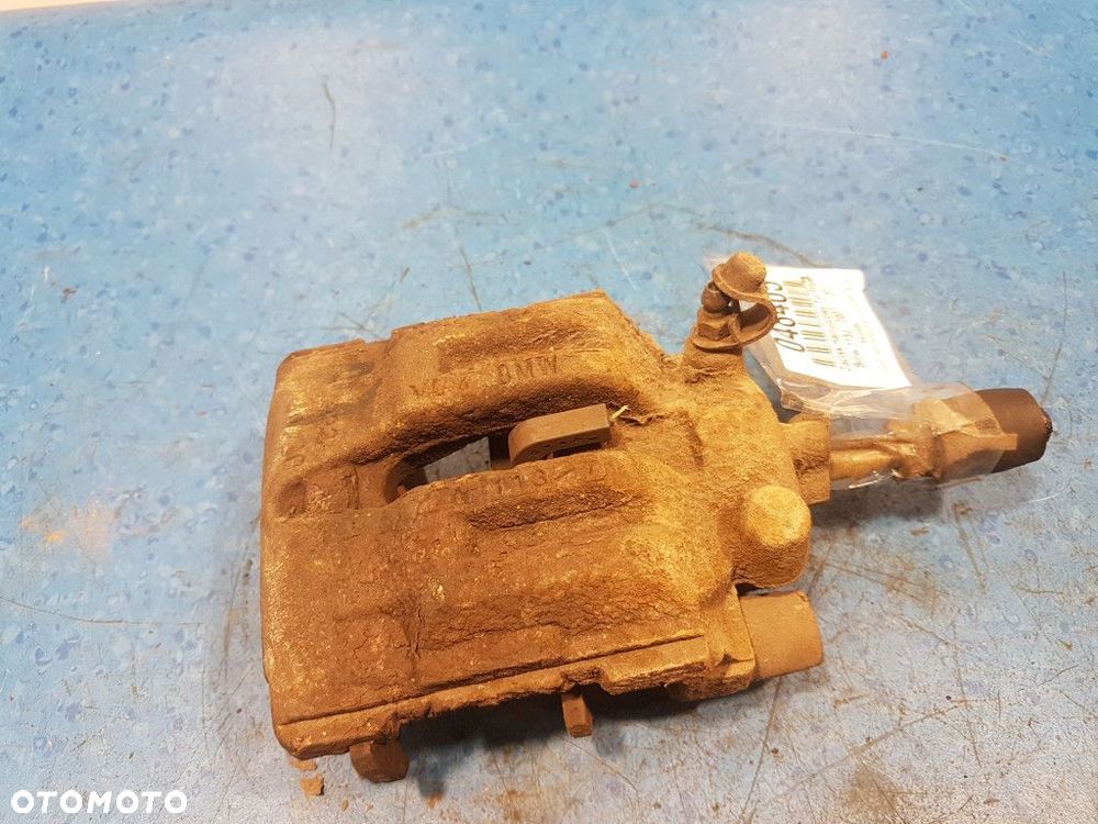 BMW 1 E87 2.0D ZACISK HAMULCOWY TYŁ PRAWY  N47