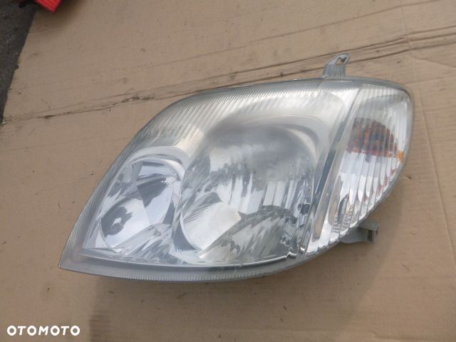 LAMPA LEWY PRZÓD LEWA PRZEDNIA TOYOTA COROLLA E12 01- - 21