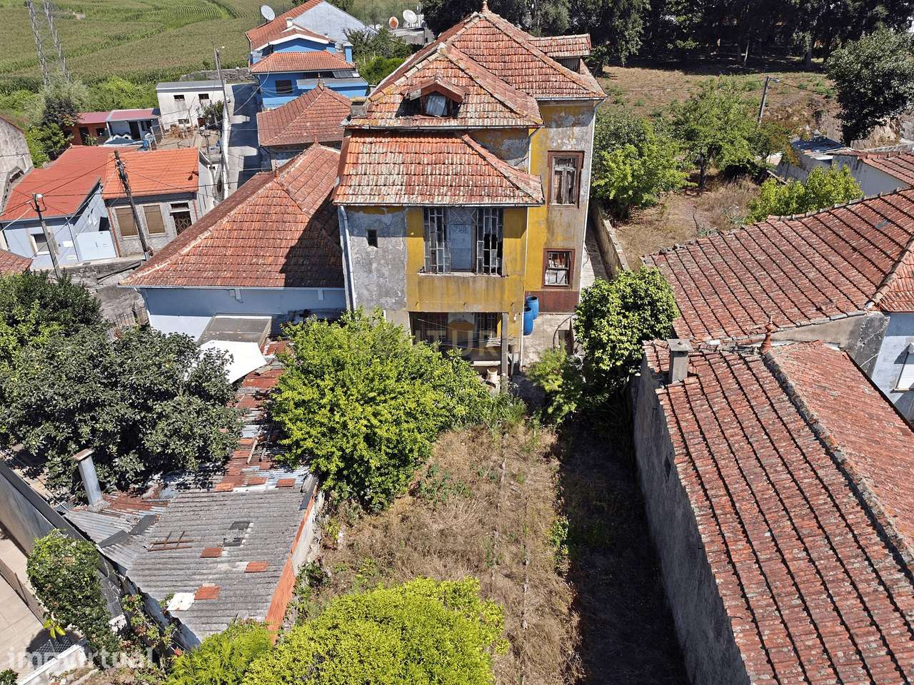 Prédio a venda no Centro de Rio Tinto Imóvel anterior a 1951 - Todo em - Grande imagem: 2/30