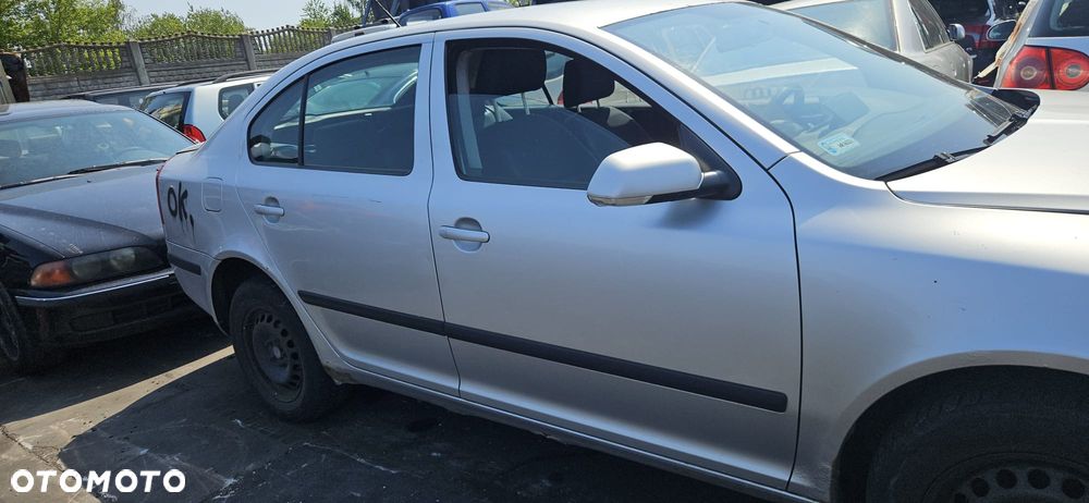 SKODA OCTAVIA II  04-08 1.9 TDI BKC - OSLONA PRZECIWSLONECZNA LEWA PRAWA - 10
