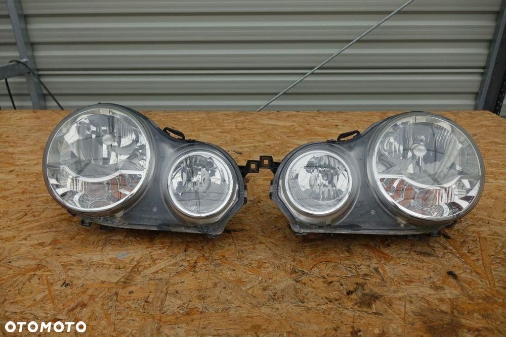 REFLEKTOR 2 LAMPY PRZÓD KPL EUROPA VW POLO 9N OKULAR 2342342 - 2