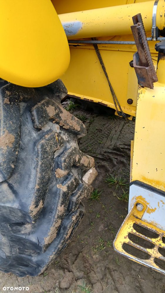 New Holland LB 115 - 23