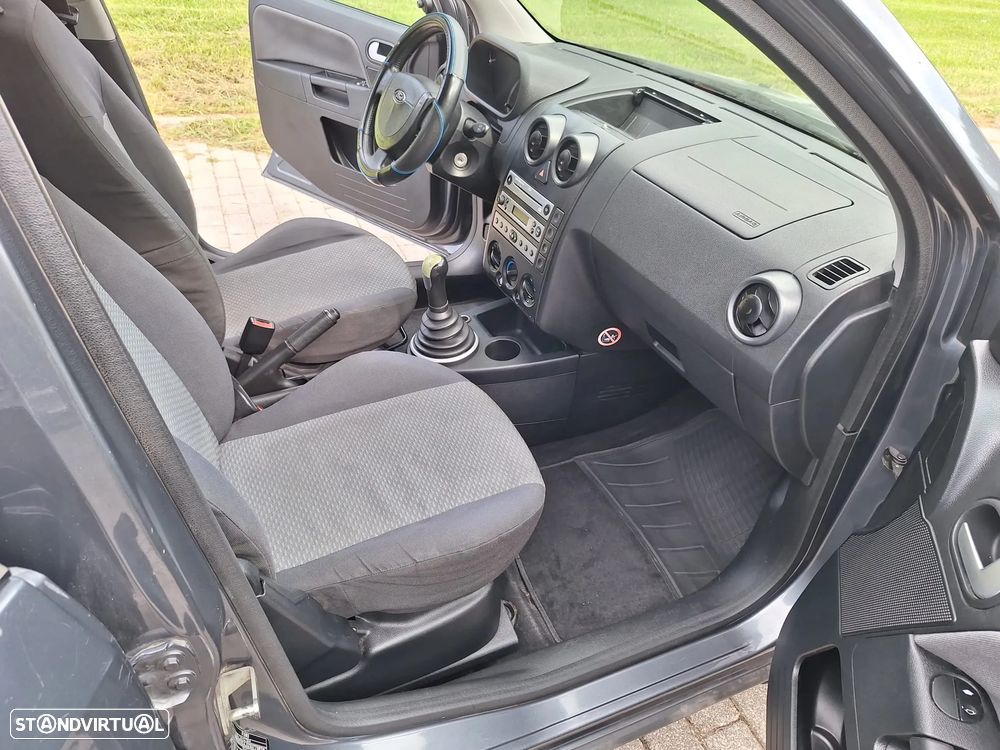 Ford Fusion 1.4 TDCi + - 11