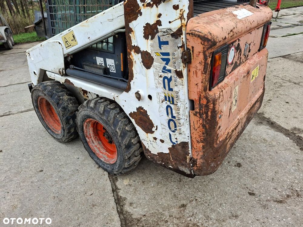 Bobcat 553 4X4 + Melroe Ingersoll-Rand 725S B/H - 30