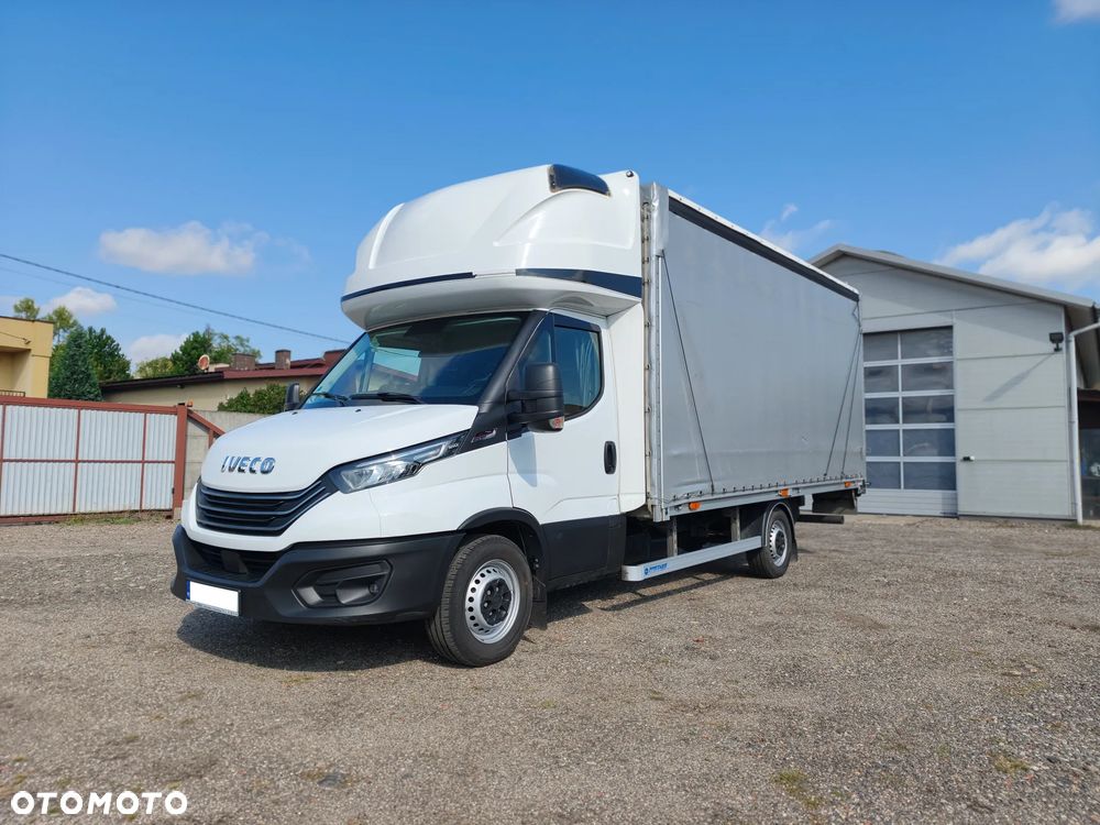 Iveco DAILY FIRANA 10EP WINDA DHOLLANDIA PLANDEKA 3.0 180KM HIMATIC AUTOMAT NAWIGACJA RADAR ASYSTENT PASA SERWIS ASO BEZWYPADKOWY ZADBANY 2024 FV23% KLIMA WEBASTO 35S18 - 4