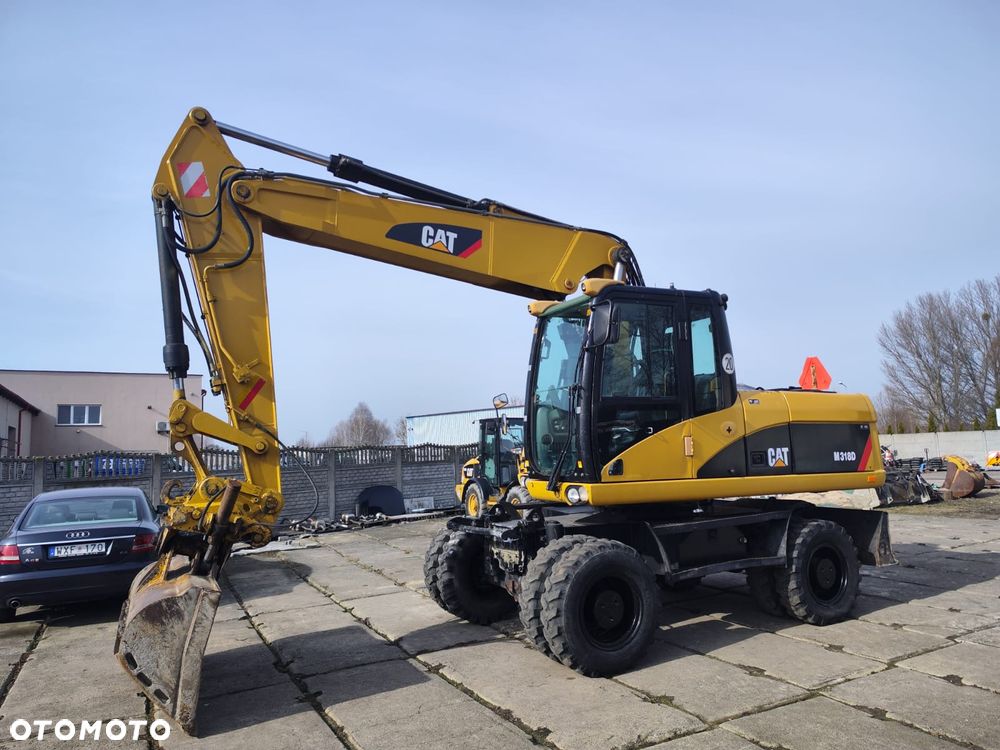 Caterpillar 318D - 1