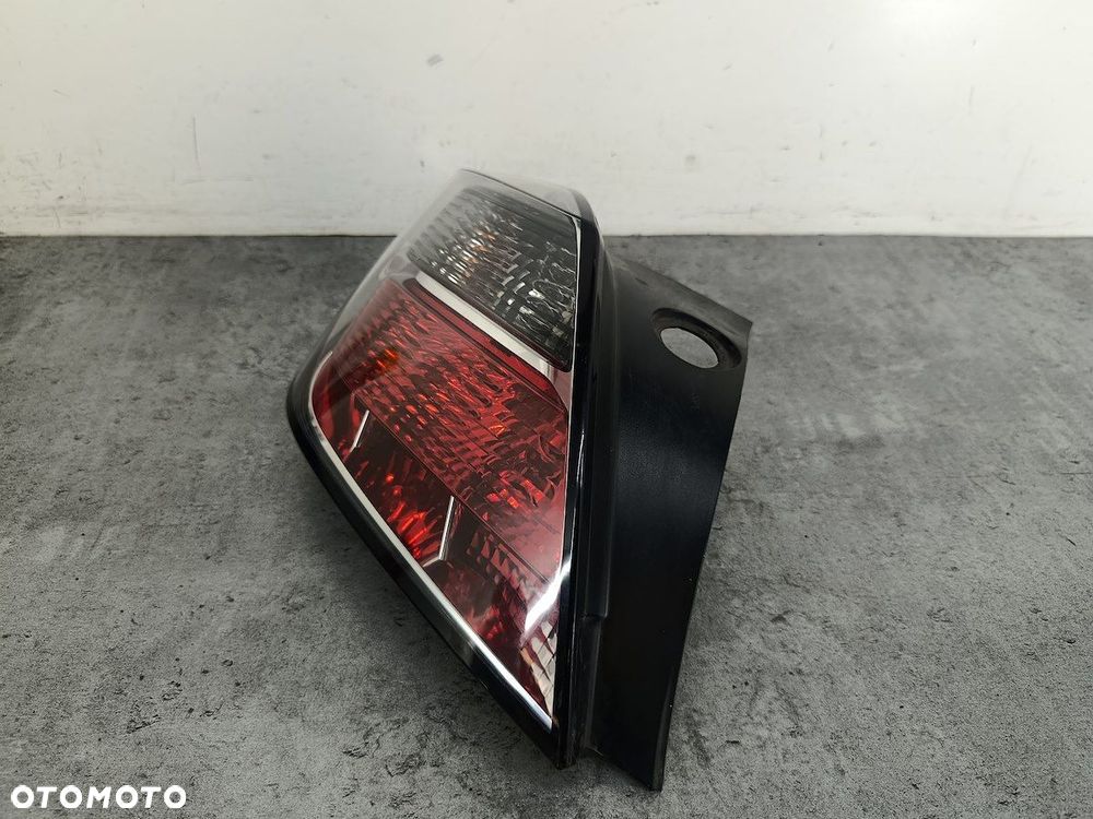 LAMPA TYLNA LEWA OPEL ASTRA H GTC 13252443  93357459 342691834 HATCHBACK 3D - 3