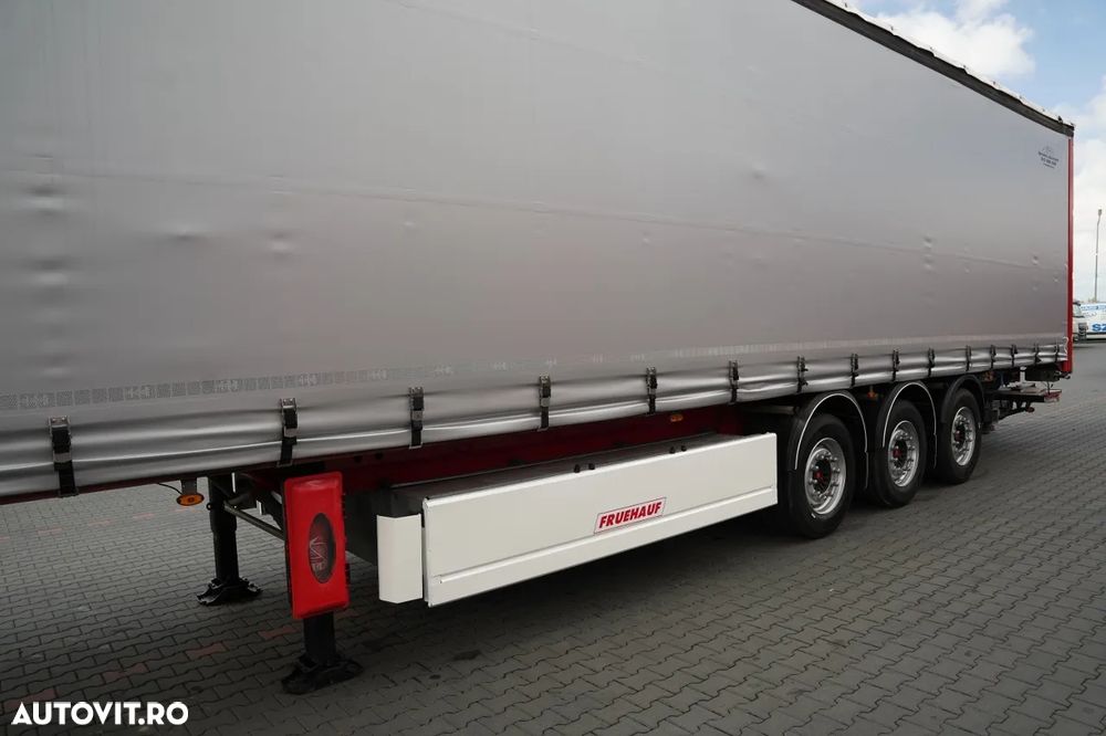 Fruehauf / SEMIREMORCĂ CU PRELATĂ (CURTAINSIDER) / TRANSPORT PALETI / PLATFORMĂ HIDRAULICĂ DHOLLANDIA - 2.000 KG / PODEA REZISTENTĂ (HEAVY-DUTY) / AXĂ LIFTABILĂ / AXE SAF / - 10