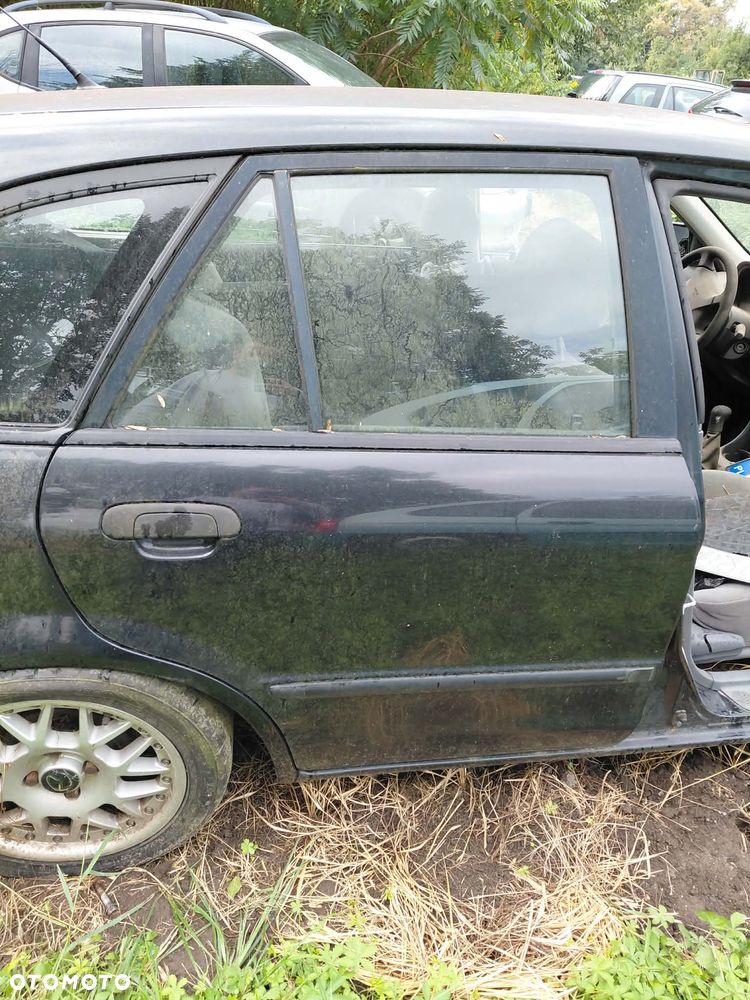części DRZWI przód lewe TYŁ prawe lewe 16W MAZDA 323F 2002r 1.5 benzyna hatchback - 3