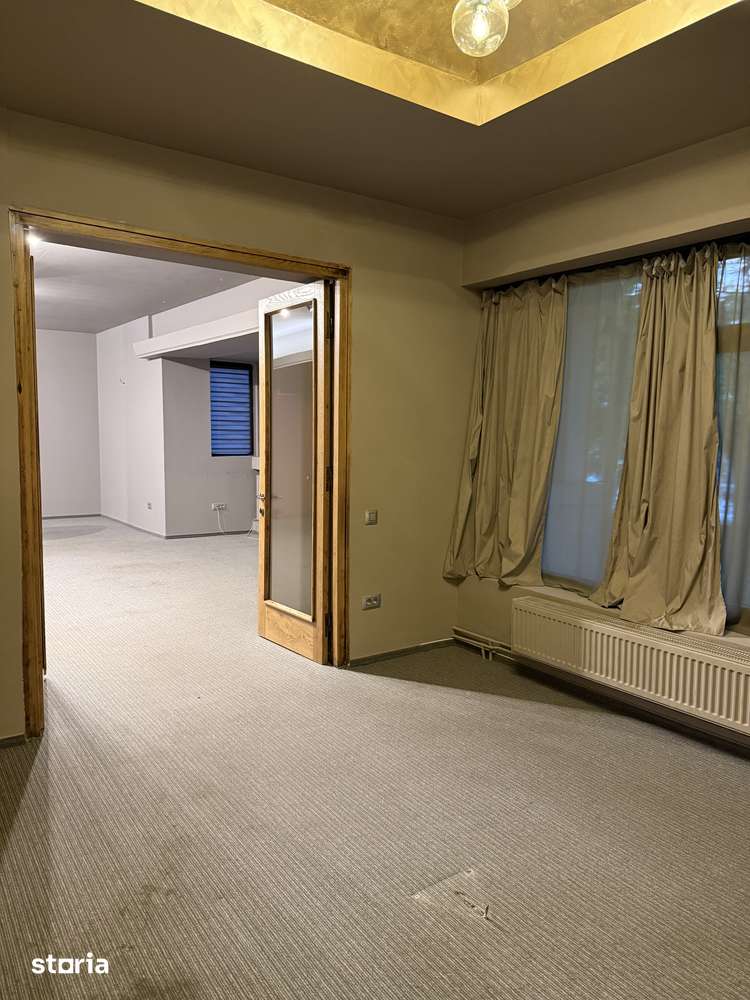 Apartament cu garaj, grădină, aer conditionat și centrală proprie — fotografia 3