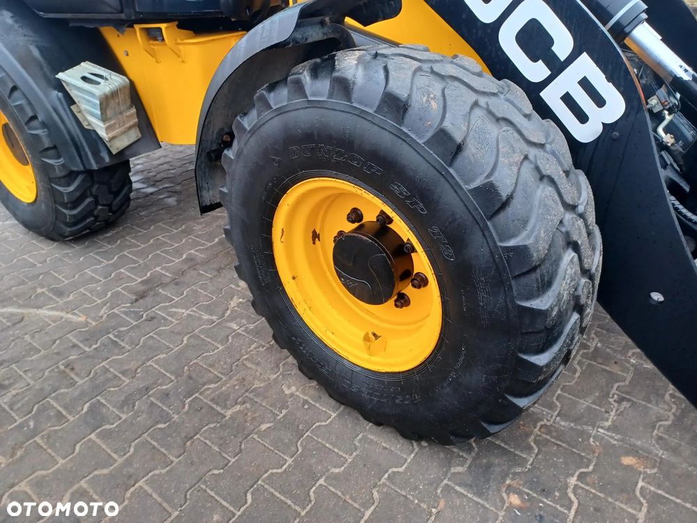 JCB 409 - 16